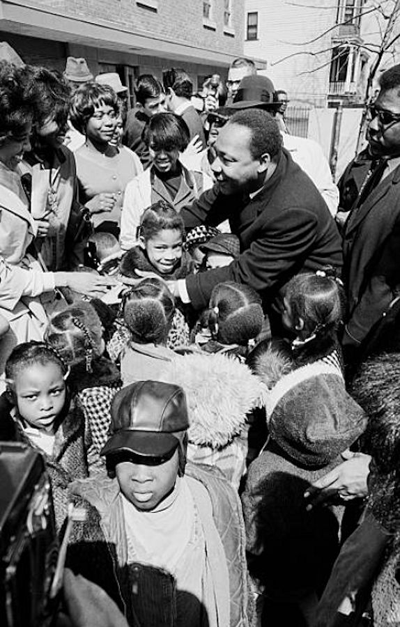 Dr. Martin Luther King
03/27/1968-Newark, NJ: Dr. Martin Luther King embraces nine-year-old Patricia Kinsey as he is greeted by school children and others at Mount Calvary Baptist Church in Newark. King toured Newark seeking support for his upcoming Poor People's Campaign in Washington, DC.

Photo from Bettmann


