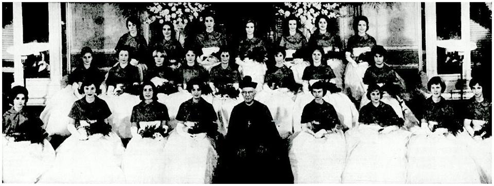 Grouped here with Archbishop Boland are 23 young woman who made their debut at the third annual Presentation Ball, held Jan, 2, 1961 at the Hotel Robert Treat. Their presentation to the Archbishop climaxed a day long series of events which began with Pontifical Mass in Sacred Heart Cathedral
